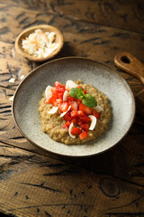 Healthy quinoa porridge with fresh strawberry