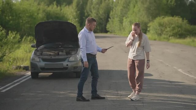 the girl calls a tow truck, and at that moment she is attacked by a maniac with a knife