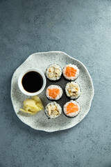 Healthy sushi rolls with salmon and eel