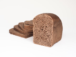 sliced brown bread on white background