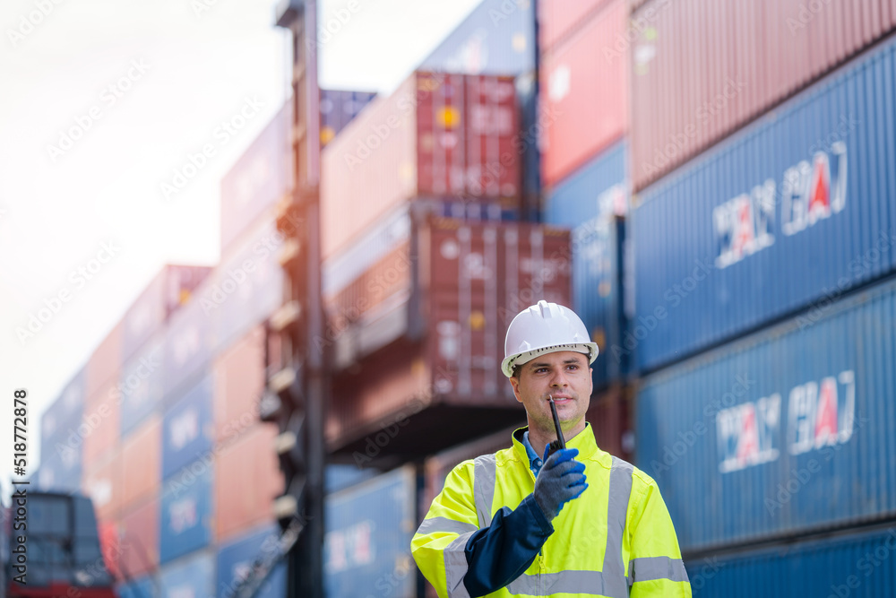 Poster Technician working checking stock into container for loading at container yard warehouse,Logistic shipping yard business,Imported product,Logistics.