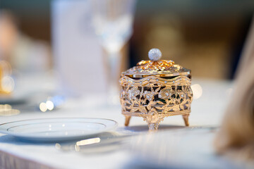 Wedding reception door gift place on the dining table