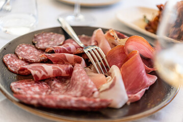 Sliced Meats on Table with Fork