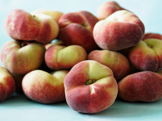 ripe peaches on a light background