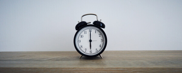 Analog alarm clock pointing at hours, minutes, seconds to display time - Photo of digital timer for...