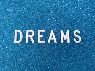 dream word on blue background