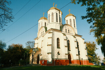 Fototapeta premium The old church on the territory of the castle. Fortified Orthodox Church to protect the people and blue sky