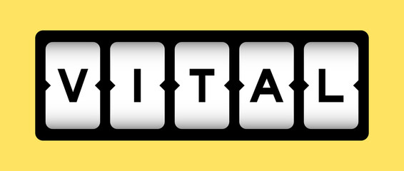 Black color in word vital on slot banner with yellow color background