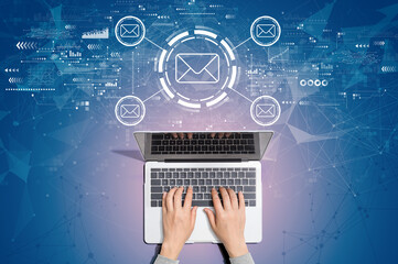 Email concept with person using a laptop computer