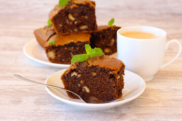 Coffee and walnut squares, served
