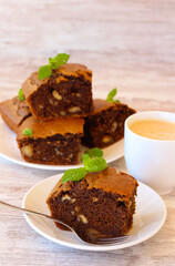 Coffee and walnut squares, served