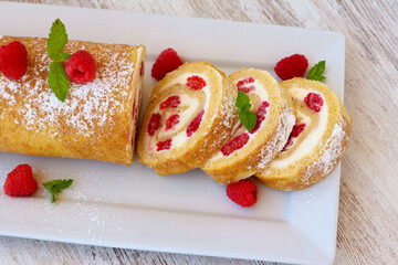Creamcheese and raspberry Swiss roll