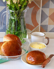 Whole grain breakfast, rolls, served with butter