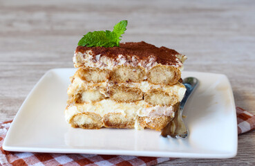 Slice of homemade tiramisu cake