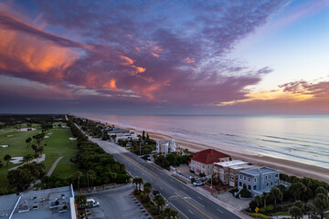 Aerial drone photo of the shore in Ormond Beach, Florida at sunrise