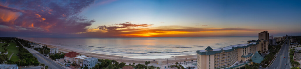 Aerial drone photo of the shore in Ormond Beach, Florida at sunrise
