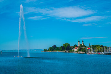 Germany, Friedrichshafen city port at bodensee lake, houses and church in beautiful nature...