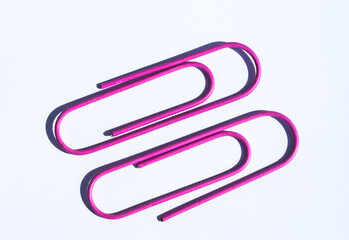 Two big pink paper clips
