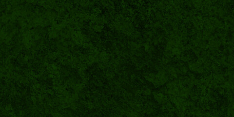 Grainy and searched green brush painted grunge texture, painted green wall background with grunge texture for wallpaper, cover, card, invitation, decoration, construction and design.