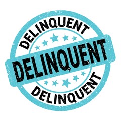 DELINQUENT text written on blue-black round stamp sign.