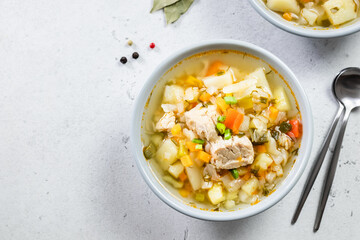 Instant pot pork soup with vegetables. Top view, copy space, flat lay.