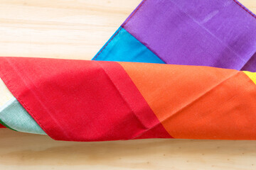 rainbow cloth on a wooden background