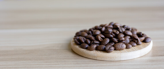 coffee beans on wooden background