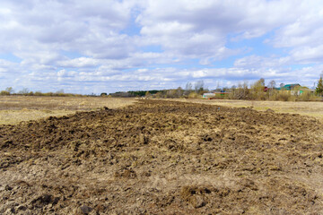 Fototapeta na wymiar Soil before planting. Land prepared for planting and cultivating the crop