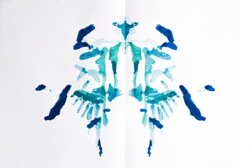 Rorschach test used in Psychoanalysis. Symmetric, mirror images made of granulated ink on white...
