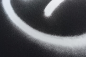 black and white background with spray painted element