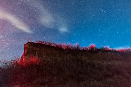 View of the sea on a moonlit night made with long exposure. Night sky. Stars. Ochakov. Ukraine