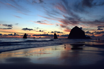 Naklejka na ściany i meble Sunset at Cannon Beach, Oregon, with Haystack Rock, Taken in Summer