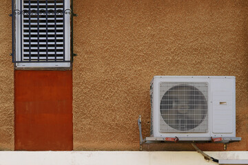 Air conditioner on the street wall of the residential house. On the facade of residential building...