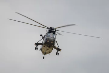 Foto op Plexiglas A vintage Westland Sea King helicopter of the Royal Navy air sea rescue © fotogenix