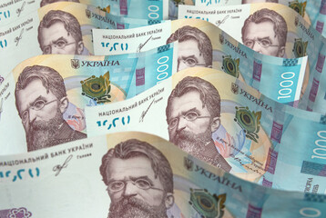 Banknotes of one thousand Ukrainian hryvnia close up