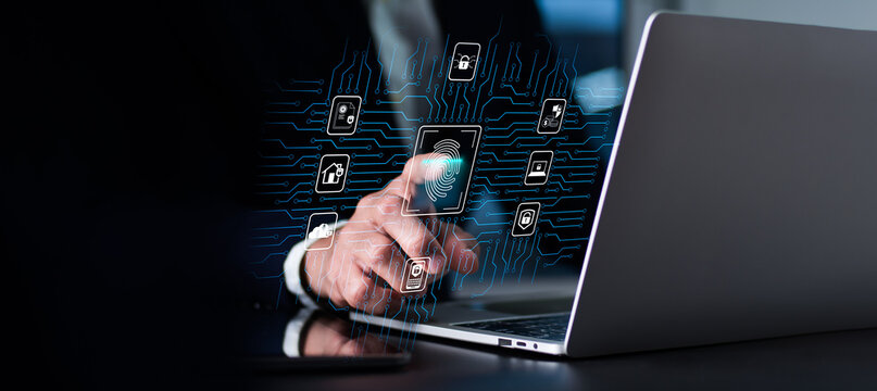 To access a private system. Biometric fingerprint scanning provides safe access to a secured data network. On a laptop computer, a person is employing finger print authentication technology. - Powered by Adobe