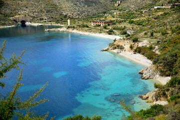 Plakat Crystal clear waters with sandy beaches and secluded bays.Along the Ionian coast is the most beautiful sea where the rugged coast offers magnificent bays with sandy or pebble beaches with a blue-green