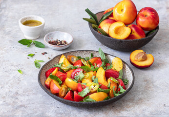 Fresh spicy salad with tomatoes and nectarines	