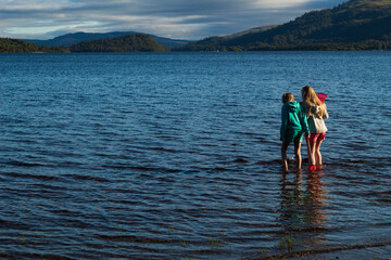 Children having fun playing on Loch Lomond Beech 