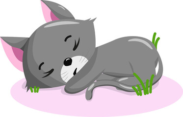 Cute sleeping kitten in the grass