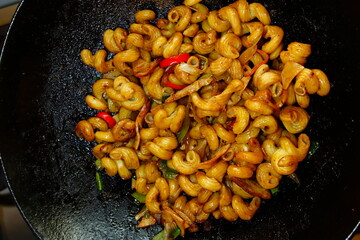 frying pan with pasta