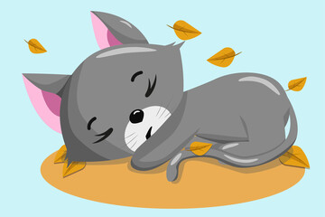Cute sleeping kitten in autumn foliage