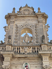 Fototapeta na wymiar Detail of baroque façade of Lecce Duomo in Puglia, Italy 