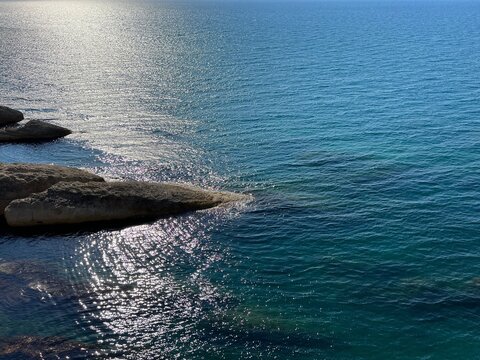 Shining sea water turquoise blue. Stunningly beautiful seascape of  scenic rocky Mediterranean coast at summer.