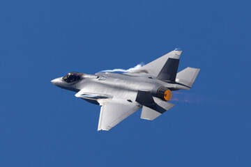 Fototapeta na wymiar close top view of a F-35A Lightning II with afterburner on