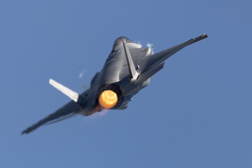 Very close tail view of a F-35A Lightning II  with afterburner on