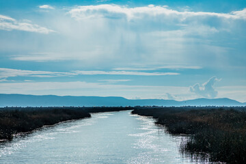 Lake Titicaca straddles the border between Peru and Bolivia in the Andes Mountains