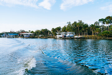 Fototapeta na wymiar Riverview, Florida, USA - 02 10 2022: River view house and dock along Little Manatee River 