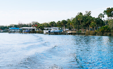 Obraz premium Riverview, Florida, USA - 02 10 2022: River view house and dock along Little Manatee River 