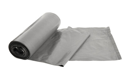 Roll of grey garbage bags on white background. Cleaning supplies
